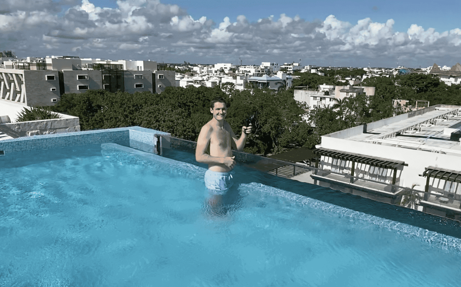 matthew swimming rooftop pool playa del carmen
