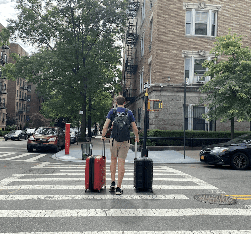 matthew carrying our digital nomad luggage nyc