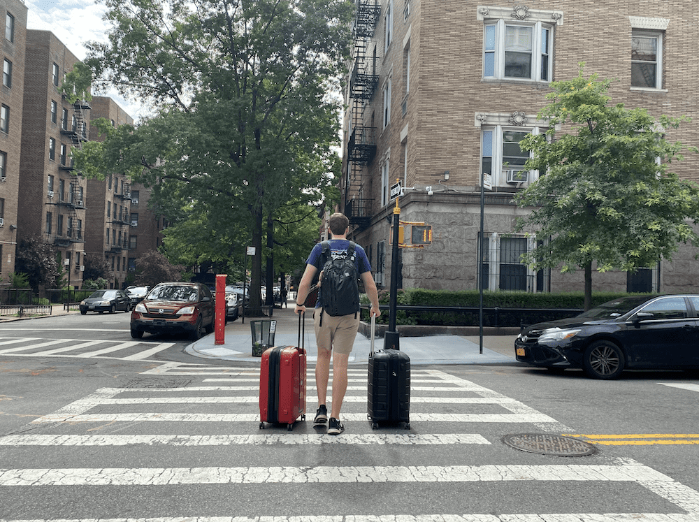 matthew carrying our digital nomad luggage nyc